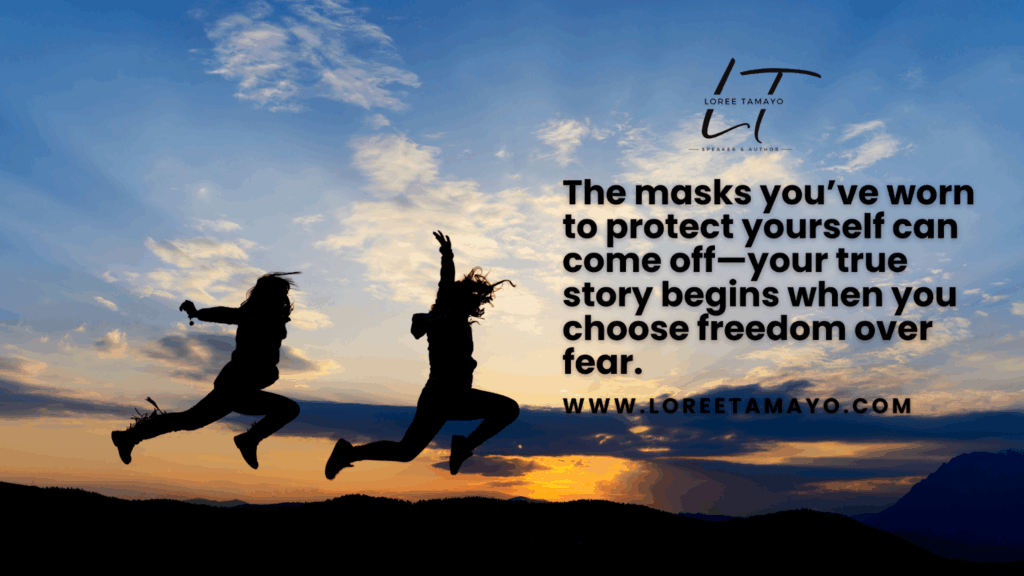 Inspirational blog banner with two women jumping freely against a sunset sky, symbolizing release and empowerment. The text reads: 'The masks you’ve worn to protect yourself can come off—your true story begins when you choose freedom over fear.' Designed for Loree Tamayo, speaker and author, with website www.loreetomayo.com Focused on overcoming the manifestations of rejection and embracing freedom.
