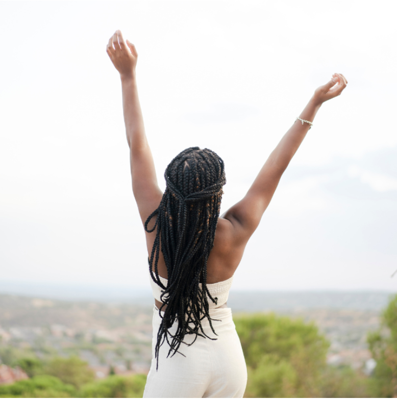 Blog banner featuring a woman in a teal dress standing beside a large tree, looking upward with hope and resilience. The text overlay reads: 'Rise stronger after every NO.' Created for Loree Tamayo, speaker and author, with website www.loreetomayo.com Focused on overcoming rejection and finding strength through resilience.