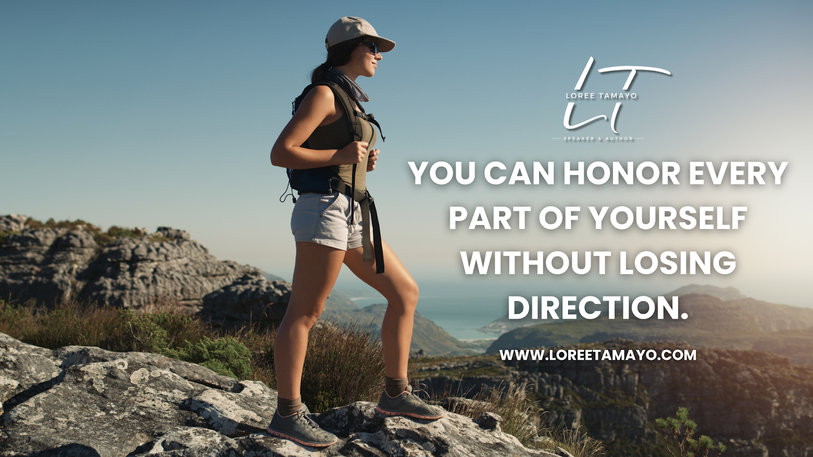 A woman wearing hiking gear stands confidently on a rocky mountain overlook, gazing toward the horizon with a sense of purpose and direction. The Loree Tamayo logo appears on the right above the text: ‘You can honor every part of yourself without losing direction.’ The website www.loreetomayo.com is displayed below.